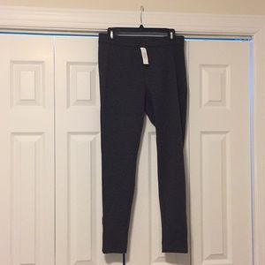 Grey skinny leg pants with side zipper
